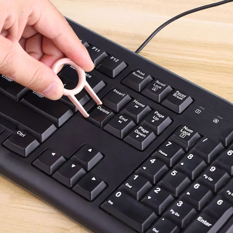 "Elektronikrengöringssats 7-i-1 i rosa och blå, med borstar och tillbehör för enkel teknologi- och gadgetrengöring."