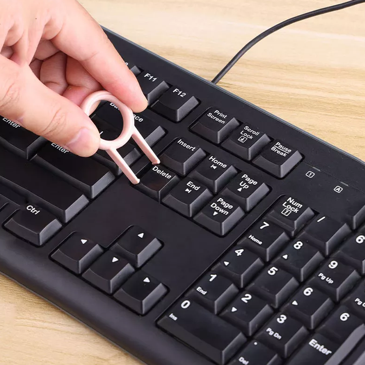 "Elektronikrengöringssats 7-i-1 i rosa och blå, med borstar och tillbehör för enkel teknologi- och gadgetrengöring."