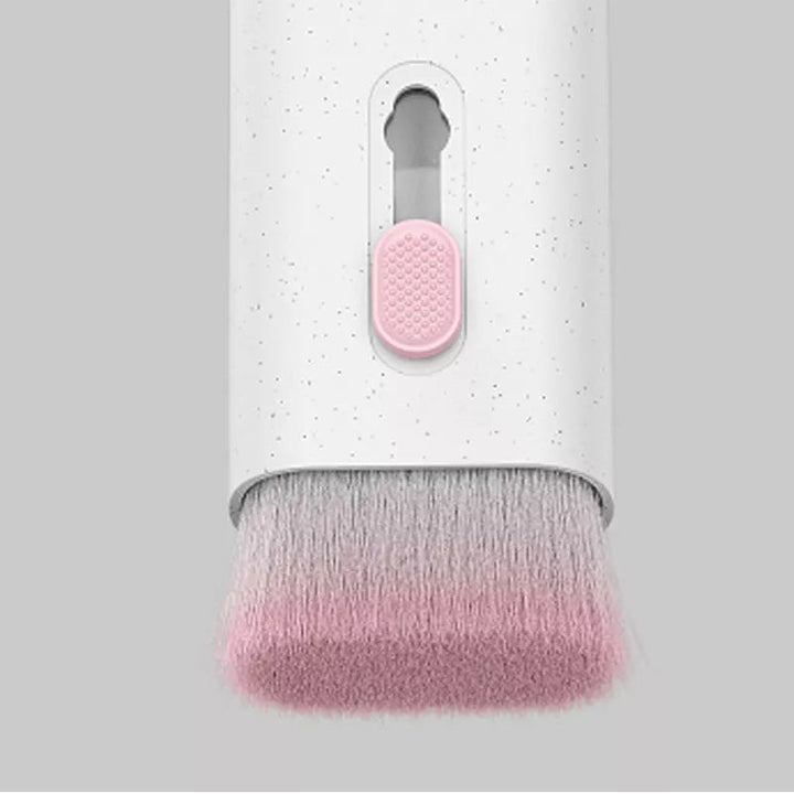 "Elektronikrengöringssats 7-i-1 i rosa och blå, med borstar och tillbehör för enkel teknologi- och gadgetrengöring."