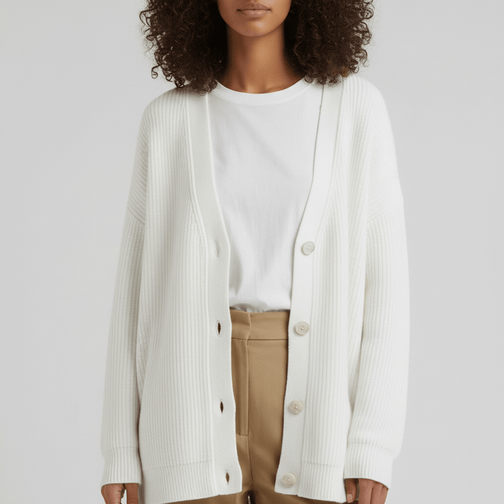 Stilren kvinnors cardigan med knappar, kombineras enkelt för en bekväm och modern lager på lager-look.