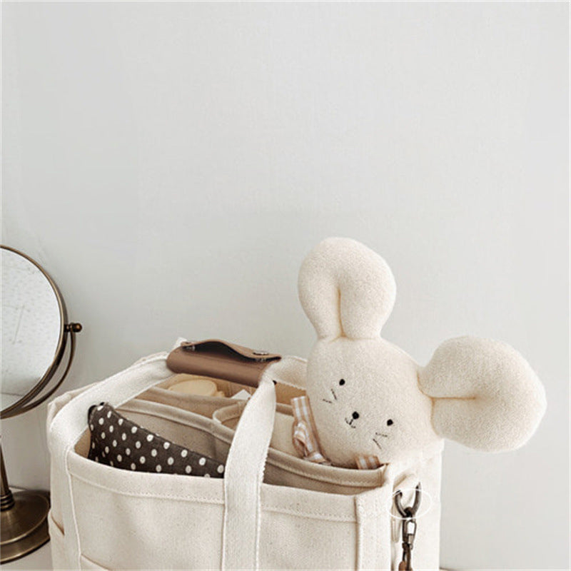 "Enfärgad dam tygkasse i robust canvas, med breda handtag och stor kapacitet. Perfekt som chic och hållbar väska."