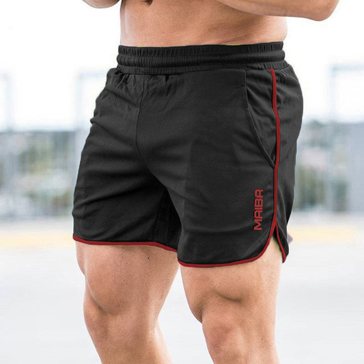 "Enfärgade monogram herr sportshorts i bomull, modern design med eleganta detaljer, idealiska för träning och vardag."