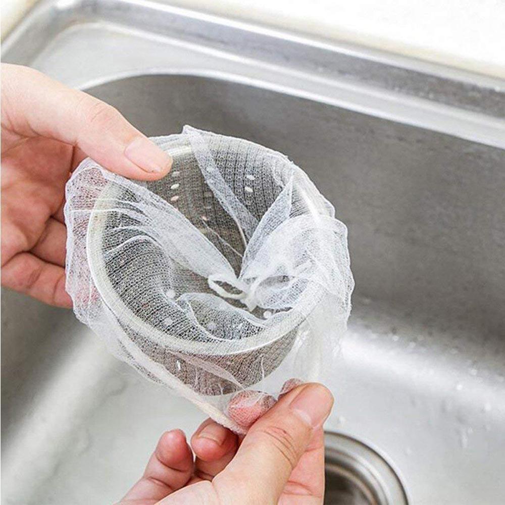 "Engångs nätpåse i filter, vit nylonnät, fångar små matrester, passar de flesta diskbänksfilter, enkel installation."