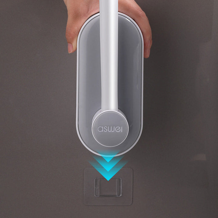 "Engångstoalettrengöringssystem med havsdofter, svartvit stav med rengöringshuvud i ljusare nyanser, klar för användning."