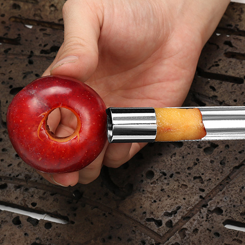 "Ergonomisk äpple corer i rostfritt stål med svart handtag, idealisk för kärning av frukt. Lätt att använda och rengöra."