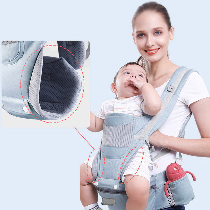 "Ergonomisk bärsele för spädbarn i grått, nio bärpositioner, perfekt för alla säsonger, maxvikt 25 kg, justerbar design"