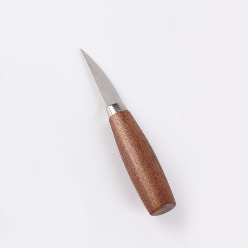 "Ergonomisk böjd sniderkniv för träbearbetning, ultraskarpt krokslipat blad och ergonomiskt grepphandtag för precision."
