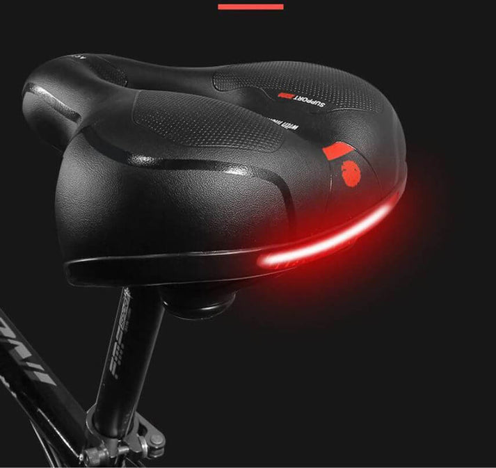 Stötdämpande cykelsadel med andningsbar design, perfekt för smärtfri cykling och fitness.