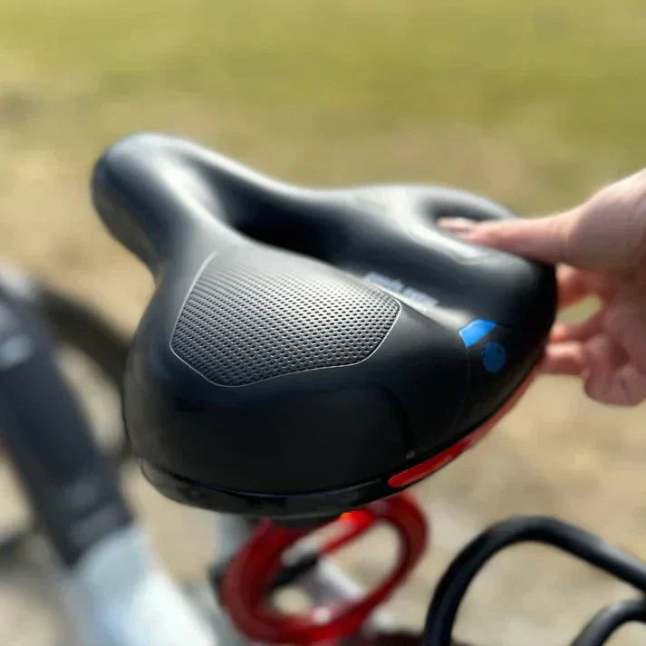 Gul ergonomisk cykelsadel som minskar tryck, idealisk för mountainbike och landsvägscykling med komfort.