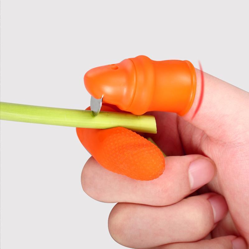 "Ergonomisk orange fingerkniv med rostfritt stålblad för effektiv grönsaksskörd i trädgården."