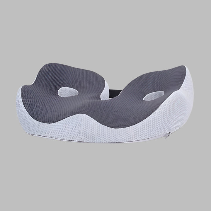 Portabel ergonomisk sittdyna i minneskum för kontorsstol, bilkudde och hemarbete. Optimerar resekomfort.