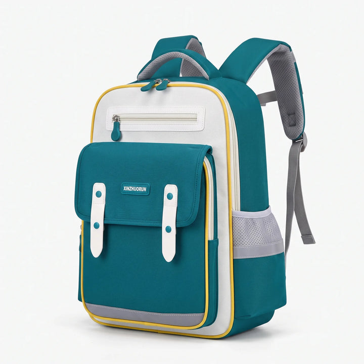Barnryggsäck med ergonomiskt ryggstöd, sidovy. Junior skolväska med reflexer och fack, perfekt för skolan.