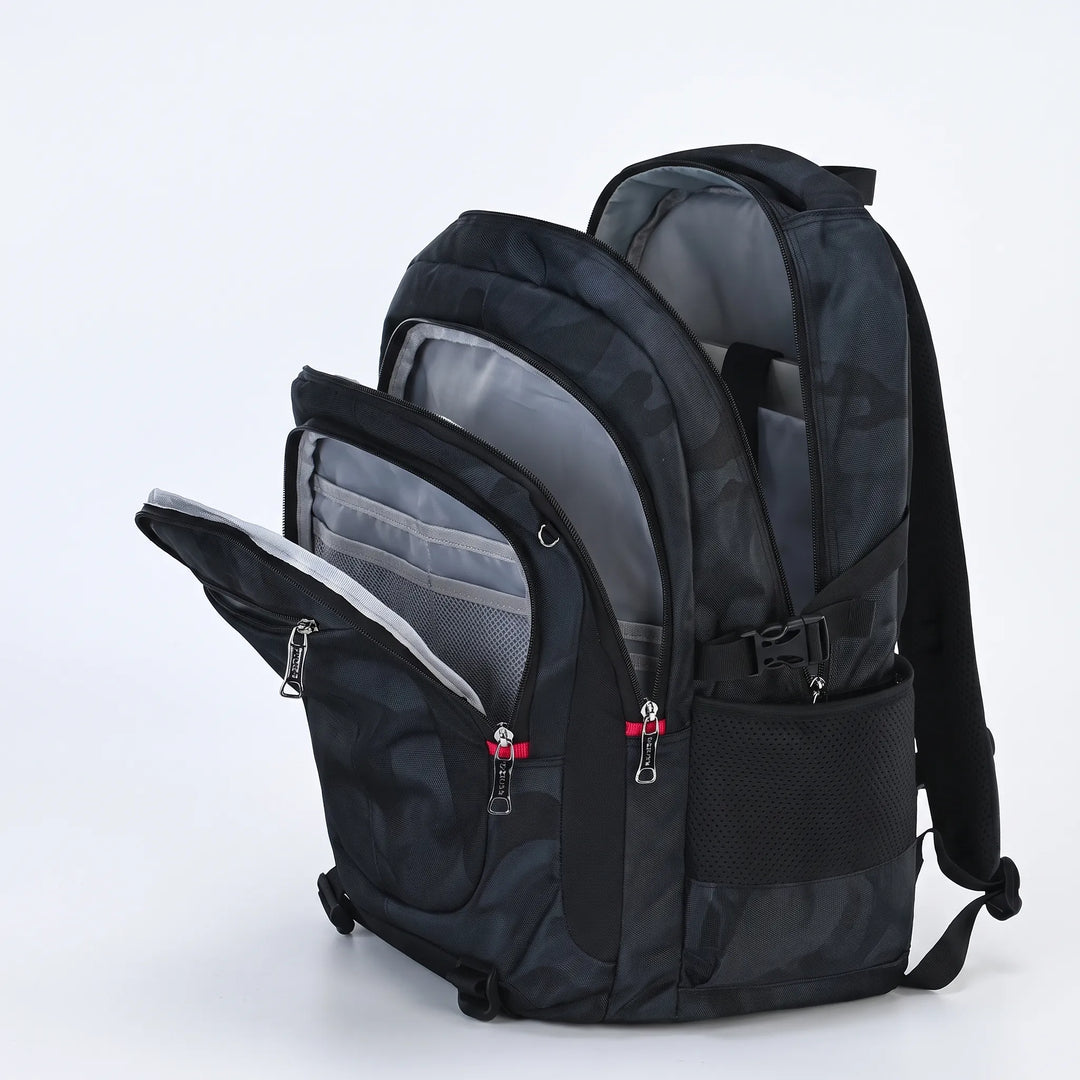 Pojkarnas skolryggsäck i nylon med dedikerat laptopfack, skyddar datorn och håller den säker.