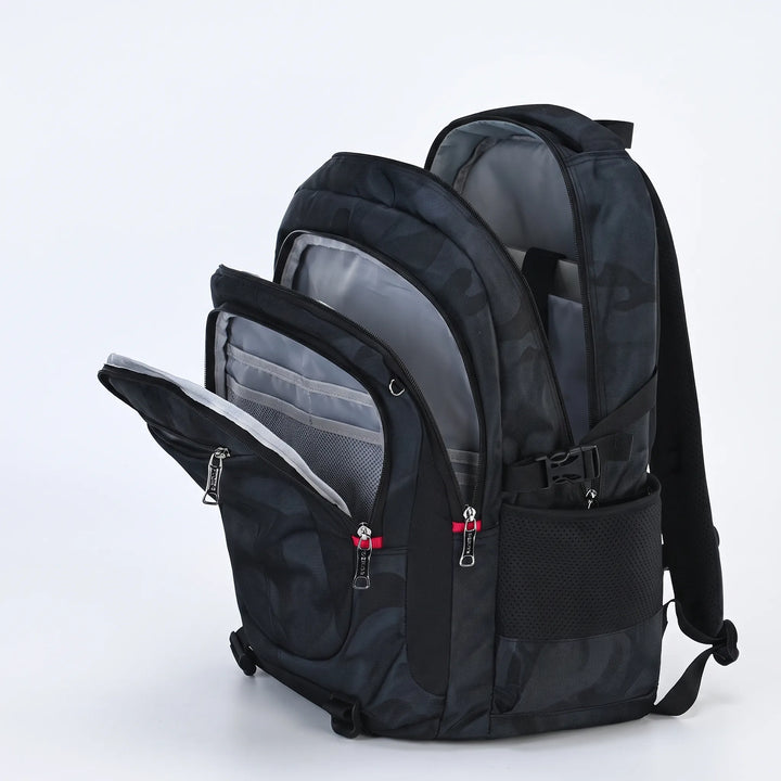 Pojkarnas skolryggsäck i nylon med dedikerat laptopfack, skyddar datorn och håller den säker.