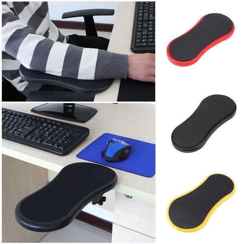 "Ergonomiskt armstöd för skrivbord, svart, gul och röd, minskar belastning, förbättrar hållning vid datorarbete."