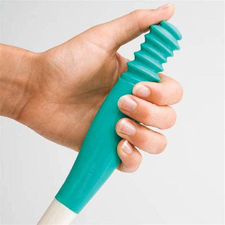 Ergonomiskt toalettpappersverktyg i plast med gummitygnd, för lättare hygien vid begränsad rörlighet, sett på vit bakgrund.