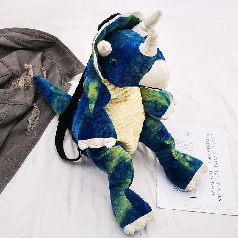 "Färgglad barnryggsäck formad som en dinosaurie, justerbar och vattentät med vadderad ryggpanel och meshtyg."