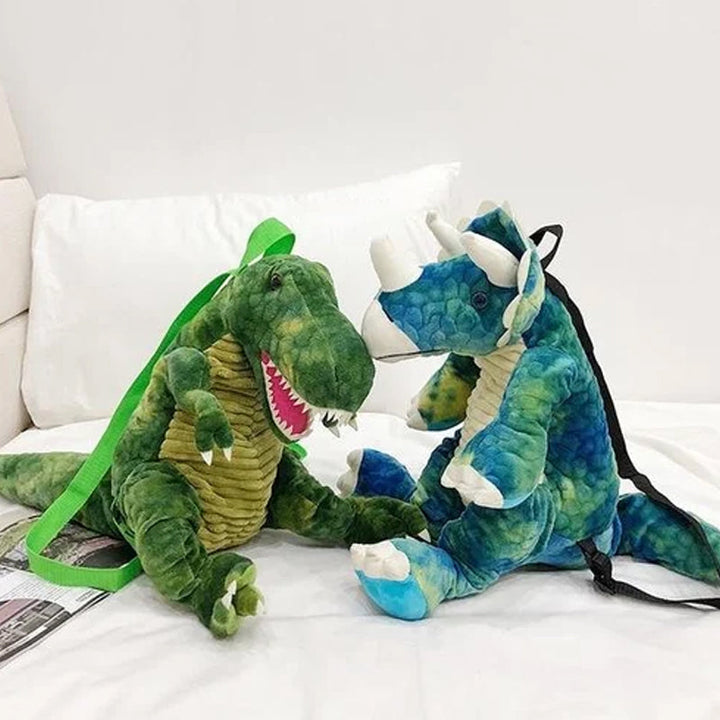 "Färgglad barnryggsäck formad som en dinosaurie, justerbar och vattentät med vadderad ryggpanel och meshtyg."