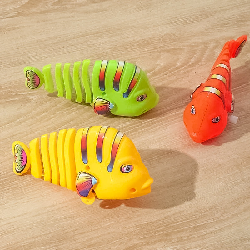 Färgglad fiskleksak för barn med livlig design, 360° rotation och säker plast. Perfekt för kreativ och rolig lek.
