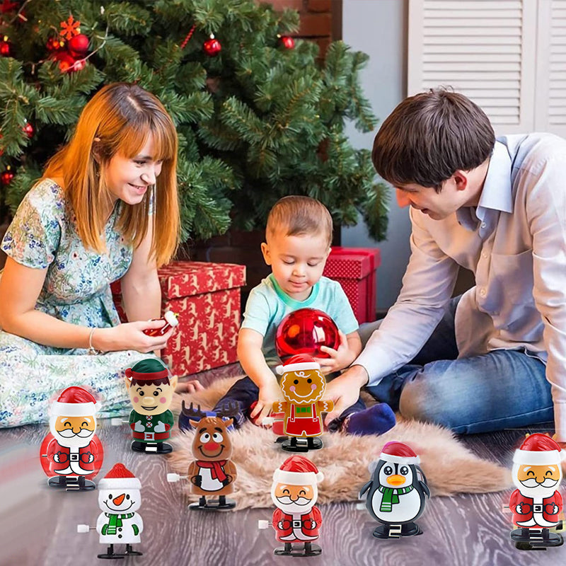 "Färgglad jul urverk leksak för barn, visar snögubbe och renmotiv, hoppar och springer utan batterier."