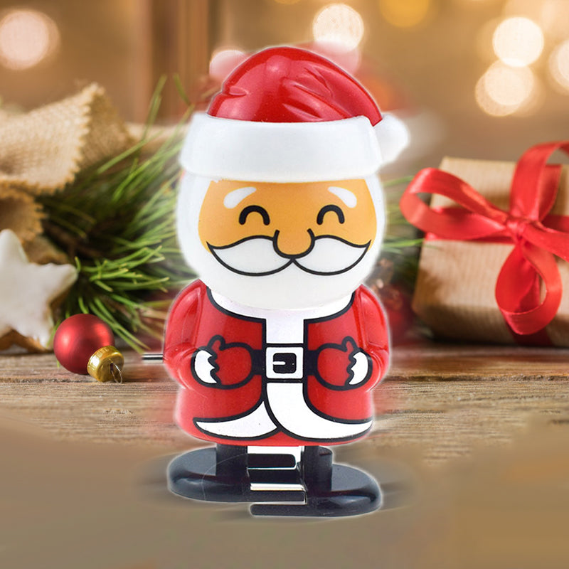 "Färgglad jul urverk leksak för barn, visar snögubbe och renmotiv, hoppar och springer utan batterier."