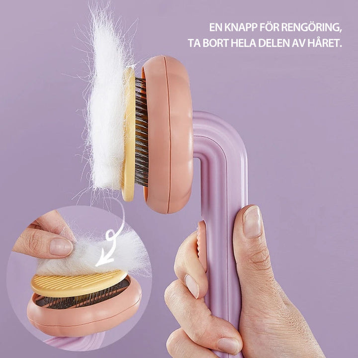 "Färgglad pumpaformad husdjursborste för hundar och katter med ergonomiskt grepp och böjda trådar för djup vård."