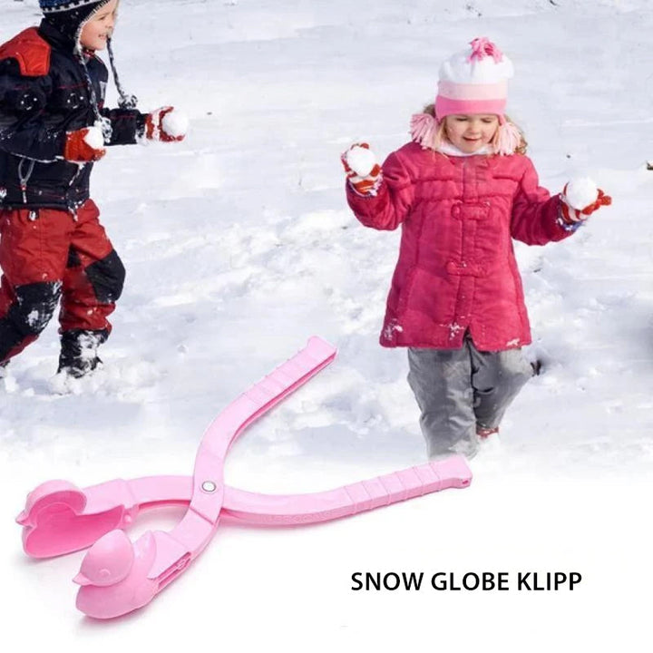 "Färgglad Snow Duck barnlekform i plast för snö och sand, ergonomisk design för enkel formning av ankor utomhus."