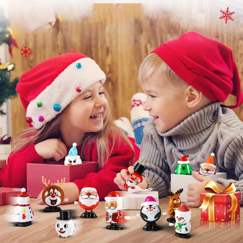"Färgglad snurrande julleksak i plast med motiv av tomte och snögubbe, perfekt för barnens festliga dekorationer."
