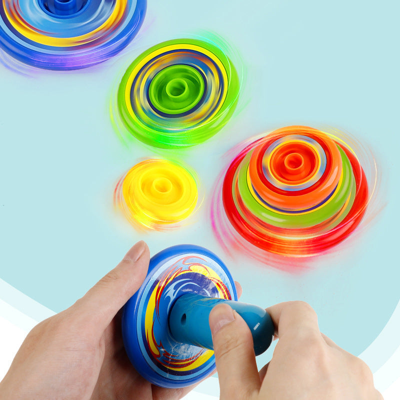 Färgglad snurrleksak i plast för barn, visar levande färger och lekfull design, stimulerar kreativitet och motorik.