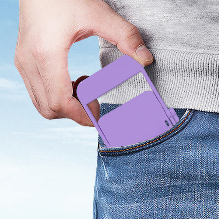 "Färgglad telefonhållare i stolform, kompakt design, finns i olika färger, perfekt för skrivbord, stilfull och praktisk."