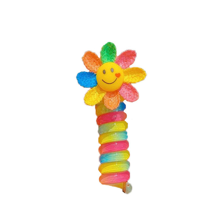 "Färgglada, elastiska hårband för barn med tecknade motiv och blommönster i flera färger, perfekta för daglig användning."