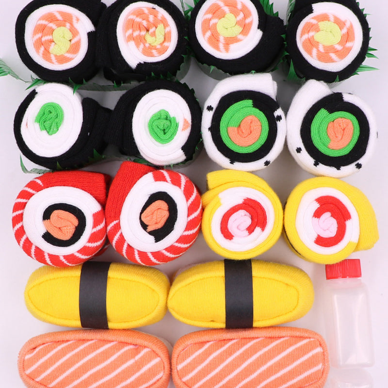 "Färgglada unisex sushi tubstrumpor i presentförpackning, designade som sushi för mode och komfort."