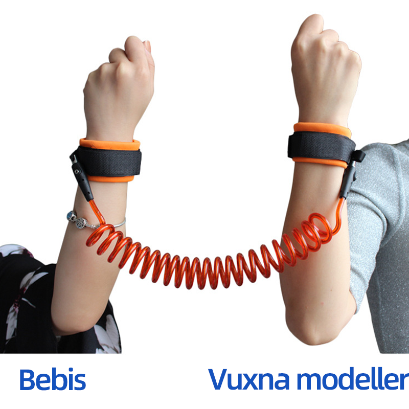 "Färgglatt barnkoppel med handledsband och ryggsäcksinfästning för säker förflyttning och fri rörelse."