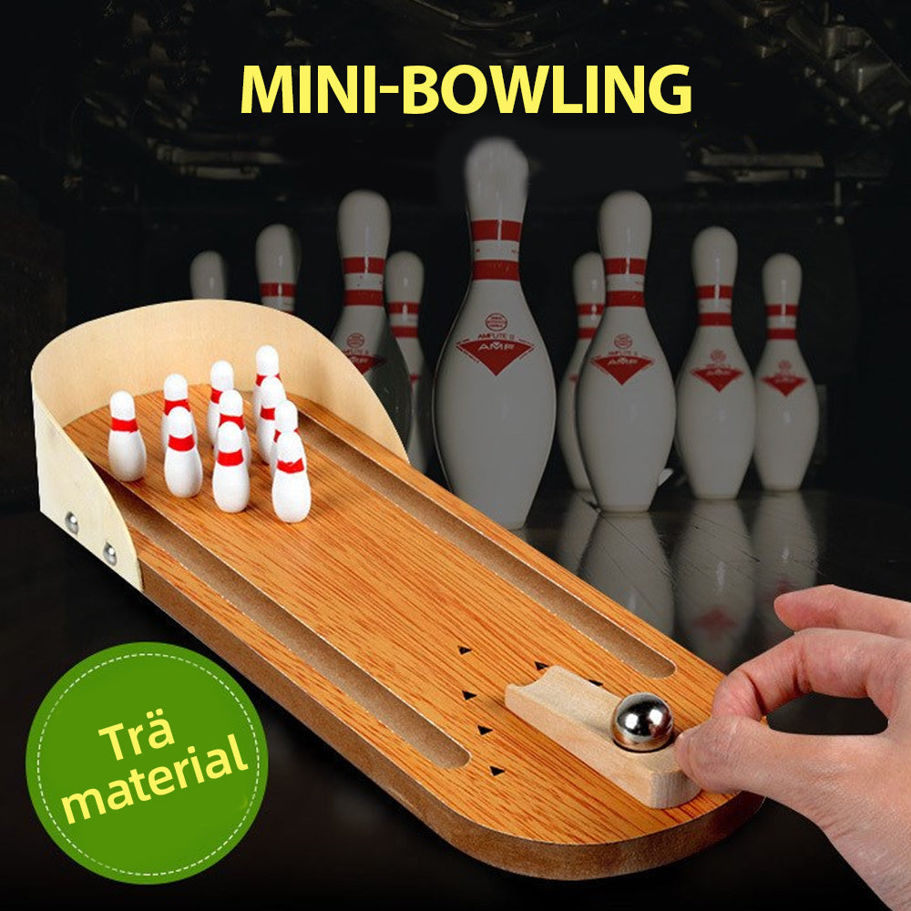 "Färgglatt mini bowling träspel för barn, med käglor och kula, perfekt för lek och träning av motorik."