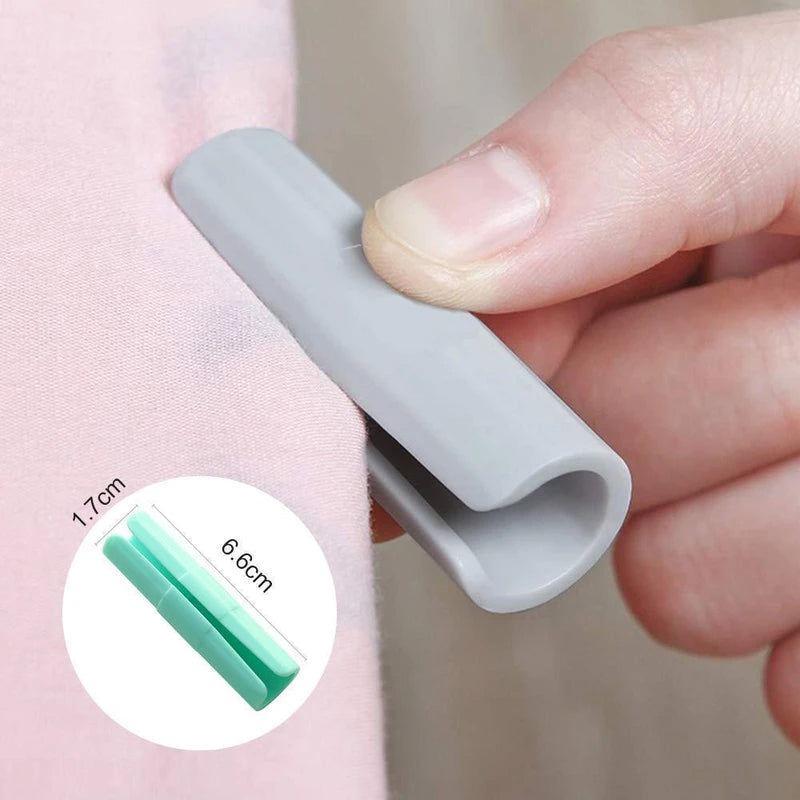 "Färggrann fästklämma i hållbar ABS-plast för perfekta lakan, visas i grönt, rosa, vitt och grått."