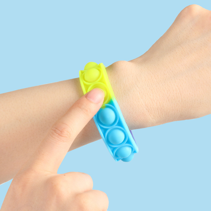 "Färggrannt unisex pop bubble armband, sensorisk leksak, med poppbara bubblor för stressavlastning och avkoppling."