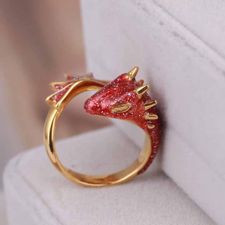"Färgstark drakring för kvinnor med justerbar storlek, i blå, röd, grön och rosa stenar, för elegant charm."