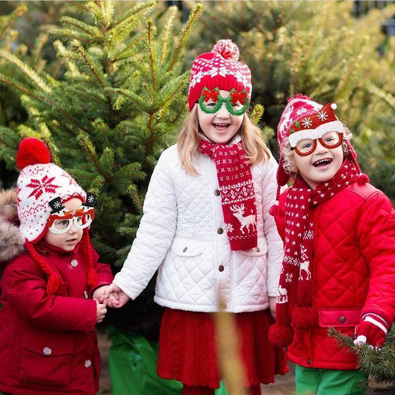 "Festliga julglasögon med glitter för vuxna och barn, glittrande dekoration i olika modeller, perfekt för julfester."