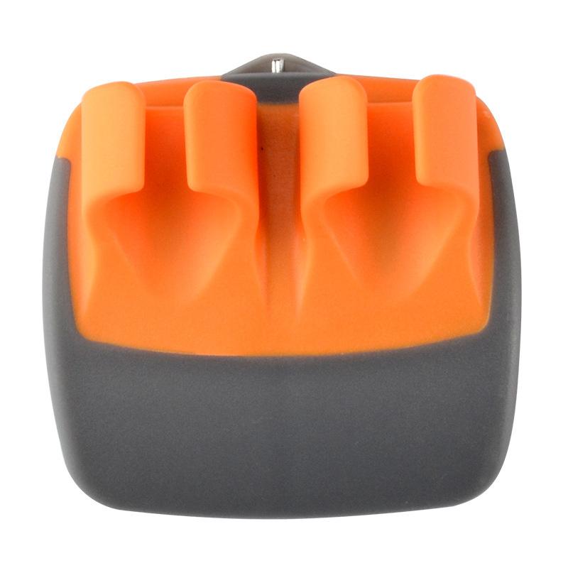 "Fingerskalare i grön och orange, ergonomisk design, kökspryl för säker och enkel hantering av frukt och grönsaker."