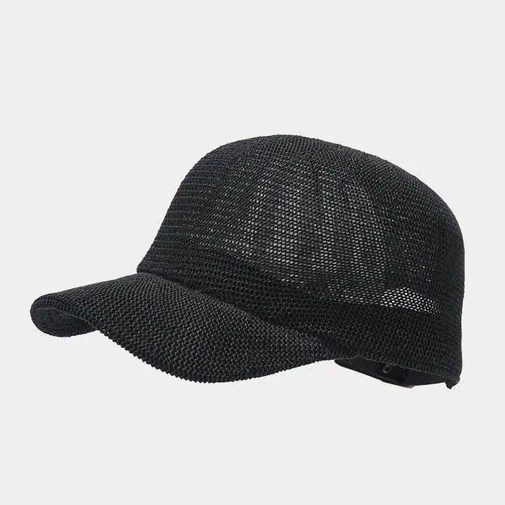 Bredskärmad solhatt för dam, flätad för optimalt UV-skydd under varma sommardagar. Stilren och funktionell strandhatt.
