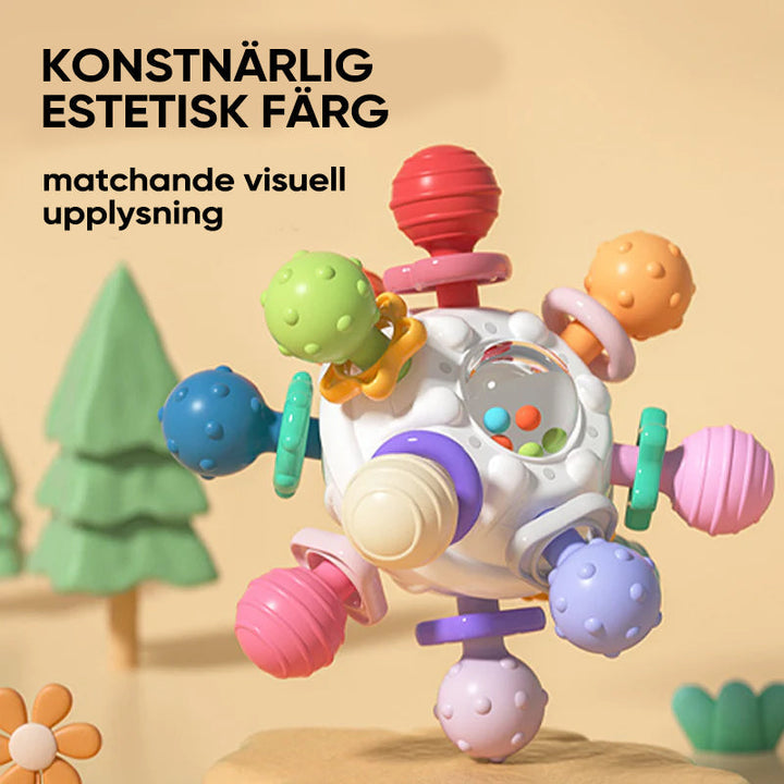 Flerfärgade babyleksaker med tandvänlig design, atomform och texturerade tuggpunkter för sensorisk stimulans.