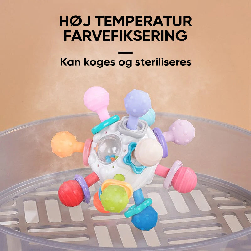 Flerfärgade babyleksaker med tandvänlig design, atomform och texturerade tuggpunkter för sensorisk stimulans.