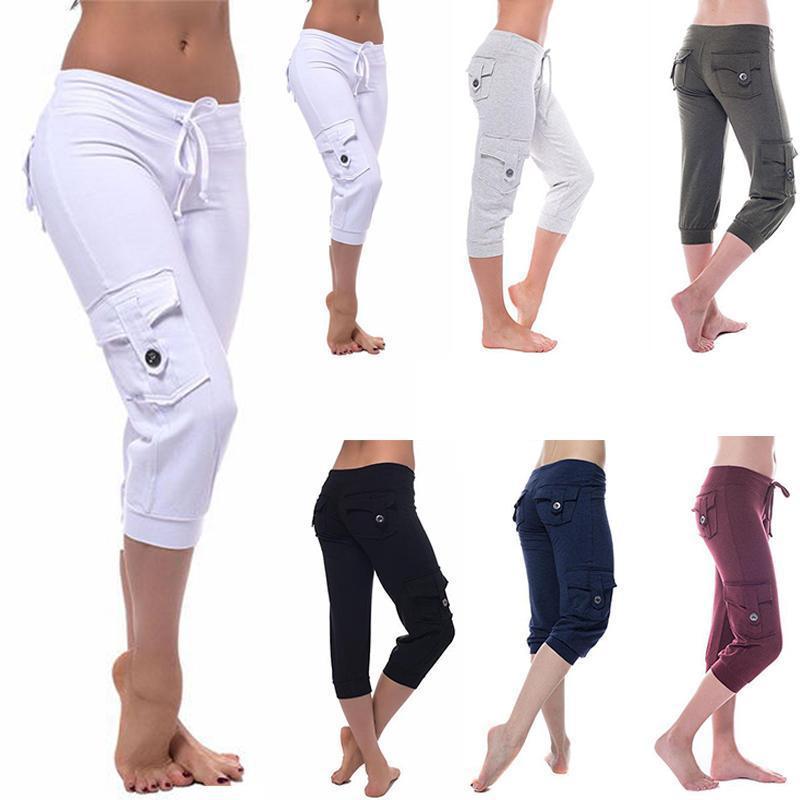 "Flerfärgade damyogabyxor med fickor och UV-skydd, mjukt och flexibelt material, stilfull design för maximal komfort."