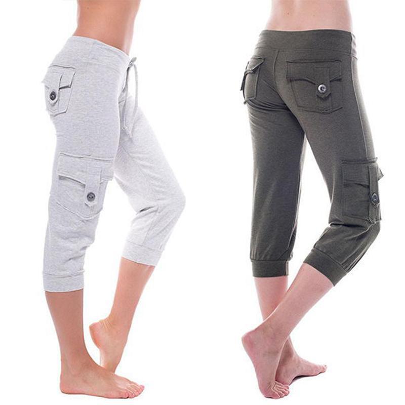 "Flerfärgade damyogabyxor med fickor och UV-skydd, mjukt och flexibelt material, stilfull design för maximal komfort."