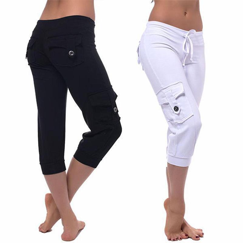 "Flerfärgade damyogabyxor med fickor och UV-skydd, mjukt och flexibelt material, stilfull design för maximal komfort."