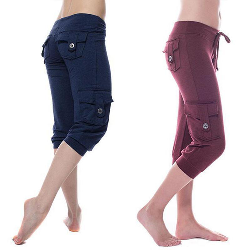 "Flerfärgade damyogabyxor med fickor och UV-skydd, mjukt och flexibelt material, stilfull design för maximal komfort."