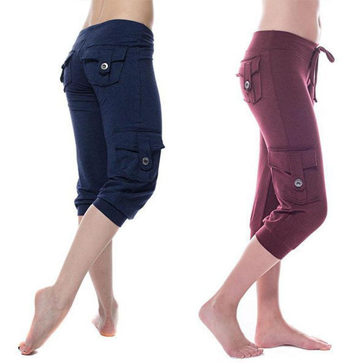 "Flerfärgade damyogabyxor med fickor och UV-skydd, mjukt och flexibelt material, stilfull design för maximal komfort."