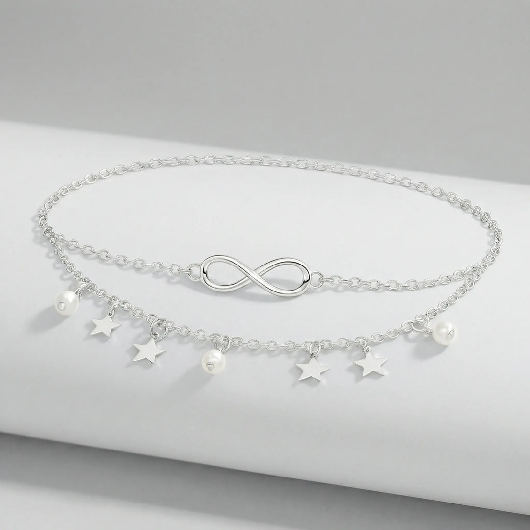 Damfotlänk Madison, flerlagig med stjärn- & pärlhängen i guld/silver. Elegant sommaraccessoar.