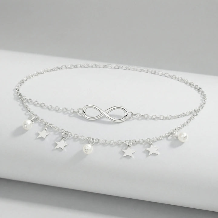 Damfotlänk Madison, flerlagig med stjärn- & pärlhängen i guld/silver. Elegant sommaraccessoar.