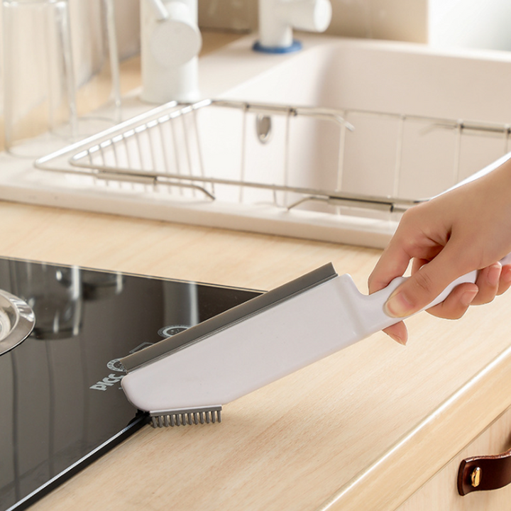 "Flexibel silikonrengöringsborste med TPR-huvud, runda borst, vit färg, perfekt för trånga köksutrymmen."